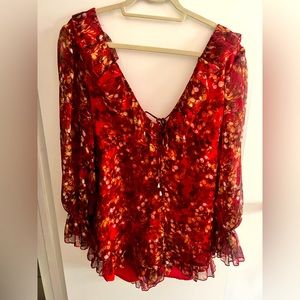 Saints + Secrets Balloon Sleeve Tied Together Red Romper in size Medium